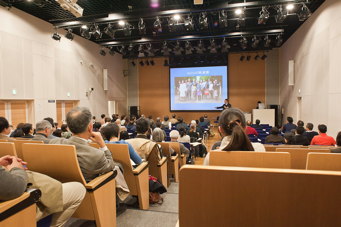 Photograph of symposium by Joanne Yu